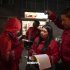 Funcionaros de la alcaldia local de San Cristóbal analizando información frente a establesimientos de comercio